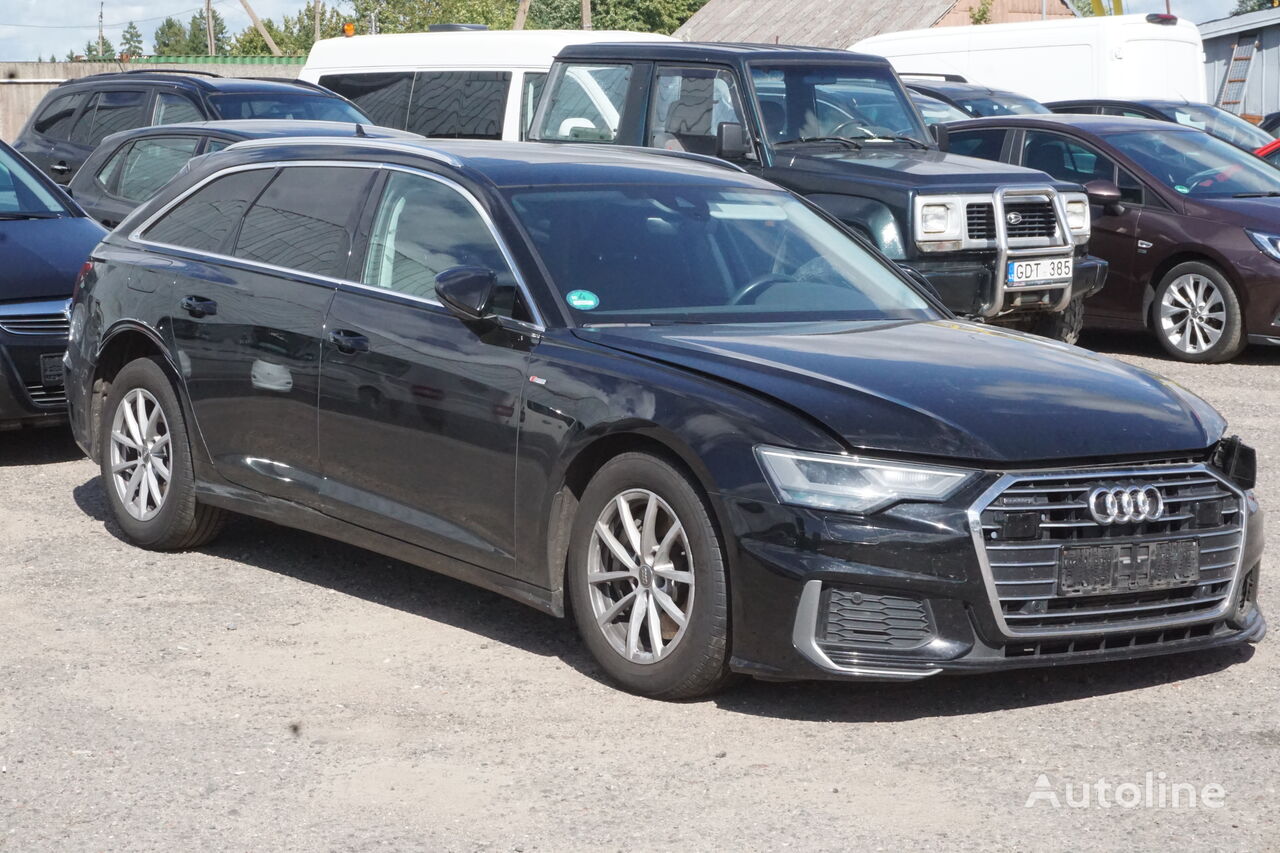 damaged Audi A6 estate car