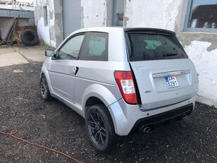 damaged Ligier hatchback