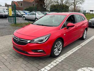 Opel Astra Sport Tourer + car
