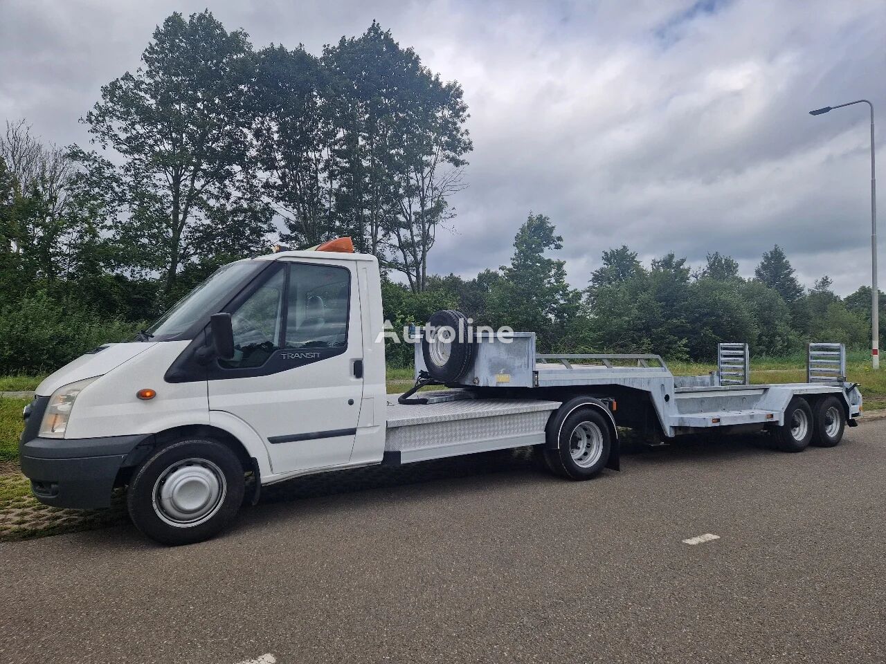 Ford Trekker met kuiper oplegger Autotransporter