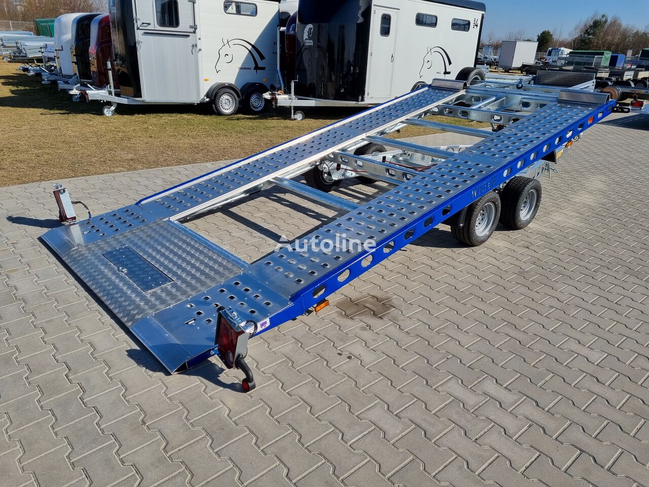 new Wiola L27G45P car trailer 2.7t GVW hydraulic lifting 400x204 cm car transporter trailer