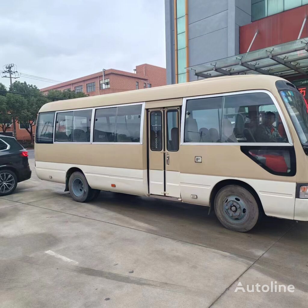 الباص السياحي Toyota coaster (1hz engine )