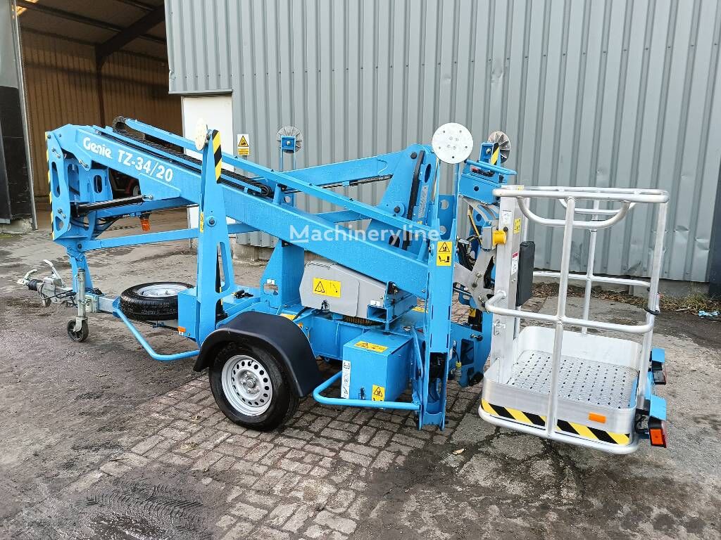 Poomtõstuk Genie TZ 34 aanhanger hoogwerker 12 m hi lift electric - Machineryline