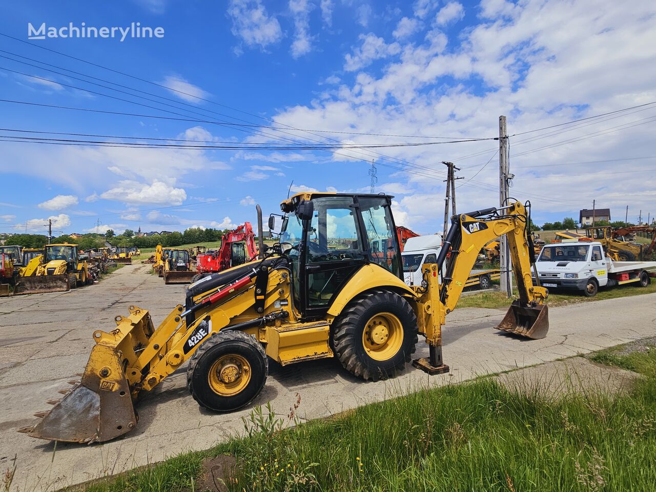 traktorbagr Caterpillar 428E