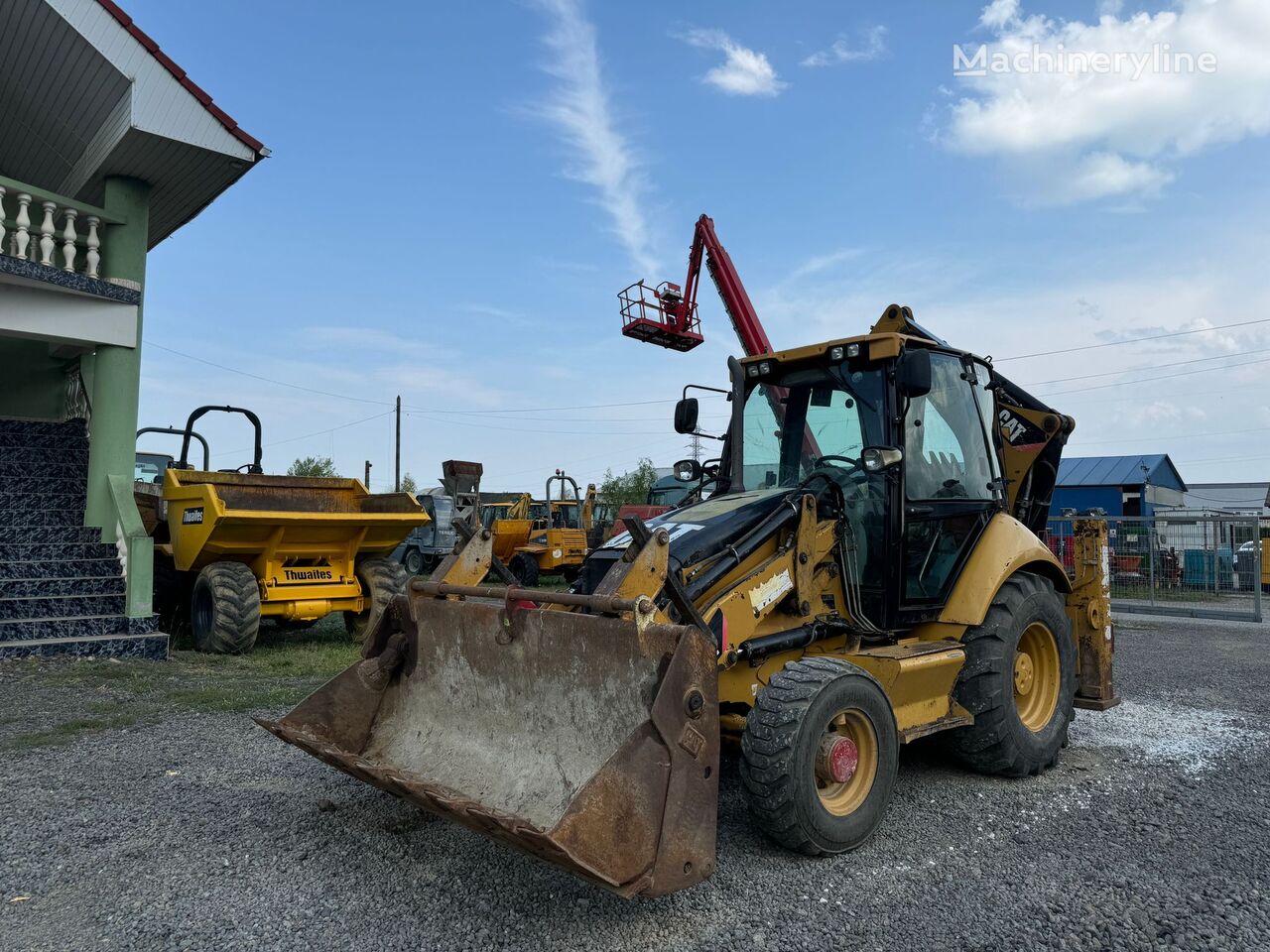 экскаватор-погрузчик Caterpillar 428E