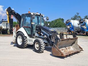 багер-натоварувач Caterpillar 428E