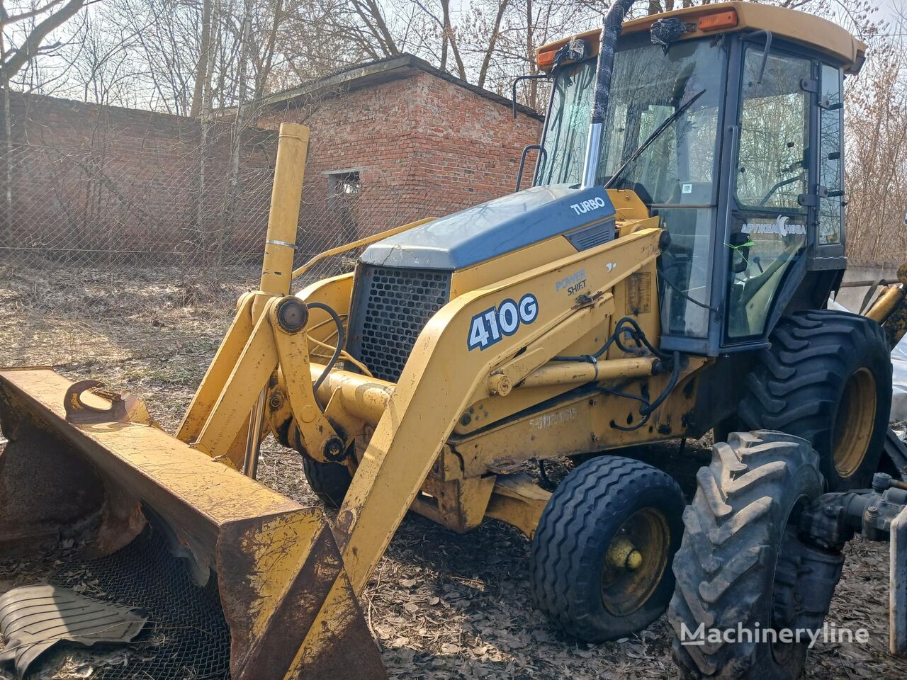 John Deere 410G kombinirka