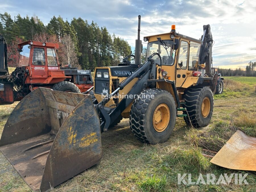 экскаватор-погрузчик Volvo 6300