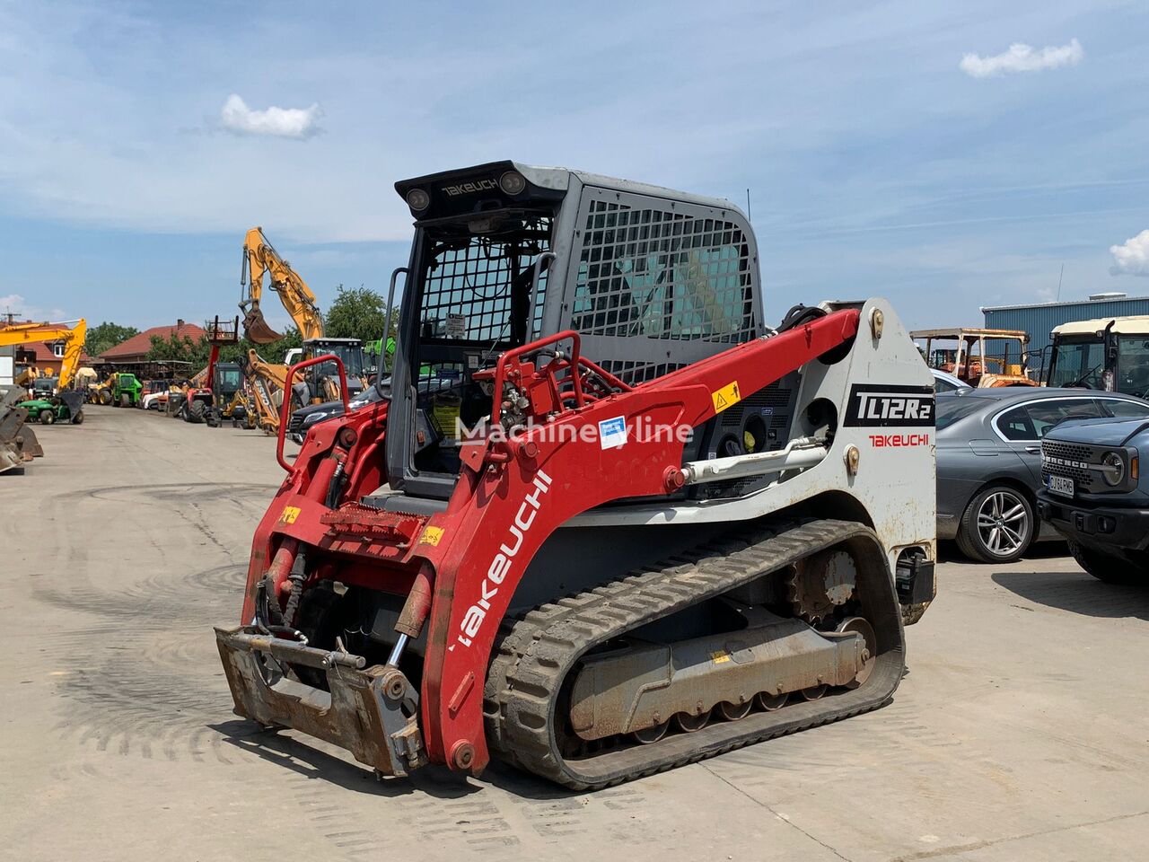 ماكينة التحميل المجنزرة الصغيرة Takeuchi TL12R2