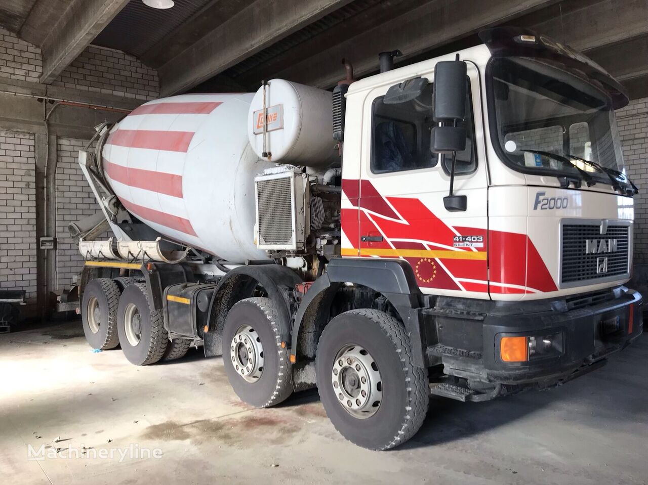 Coime  on chassis MAN 41.403 concrete mixer truck