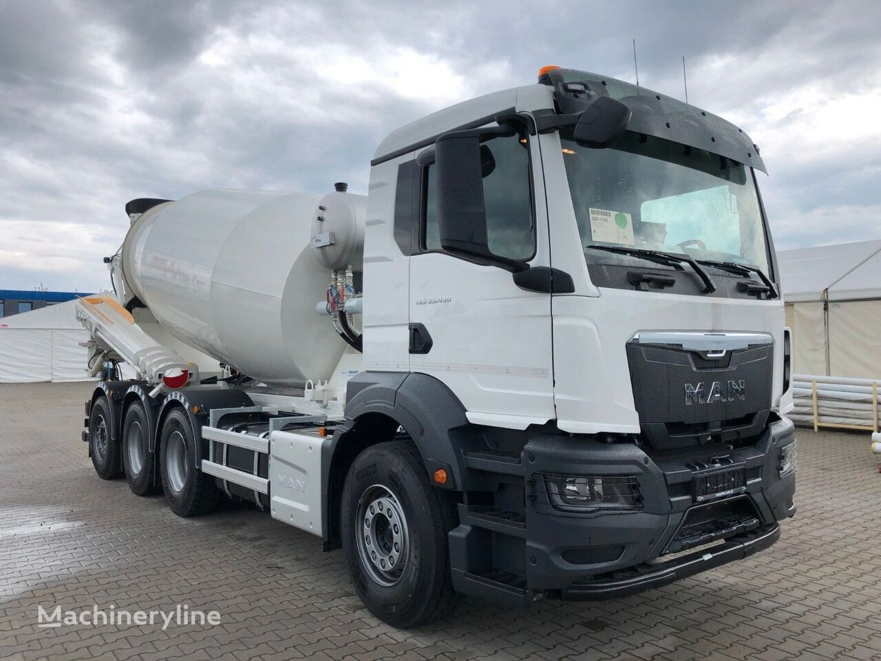 new FML  on chassis MAN TGS TRIDEM 35.430 concrete mixer truck