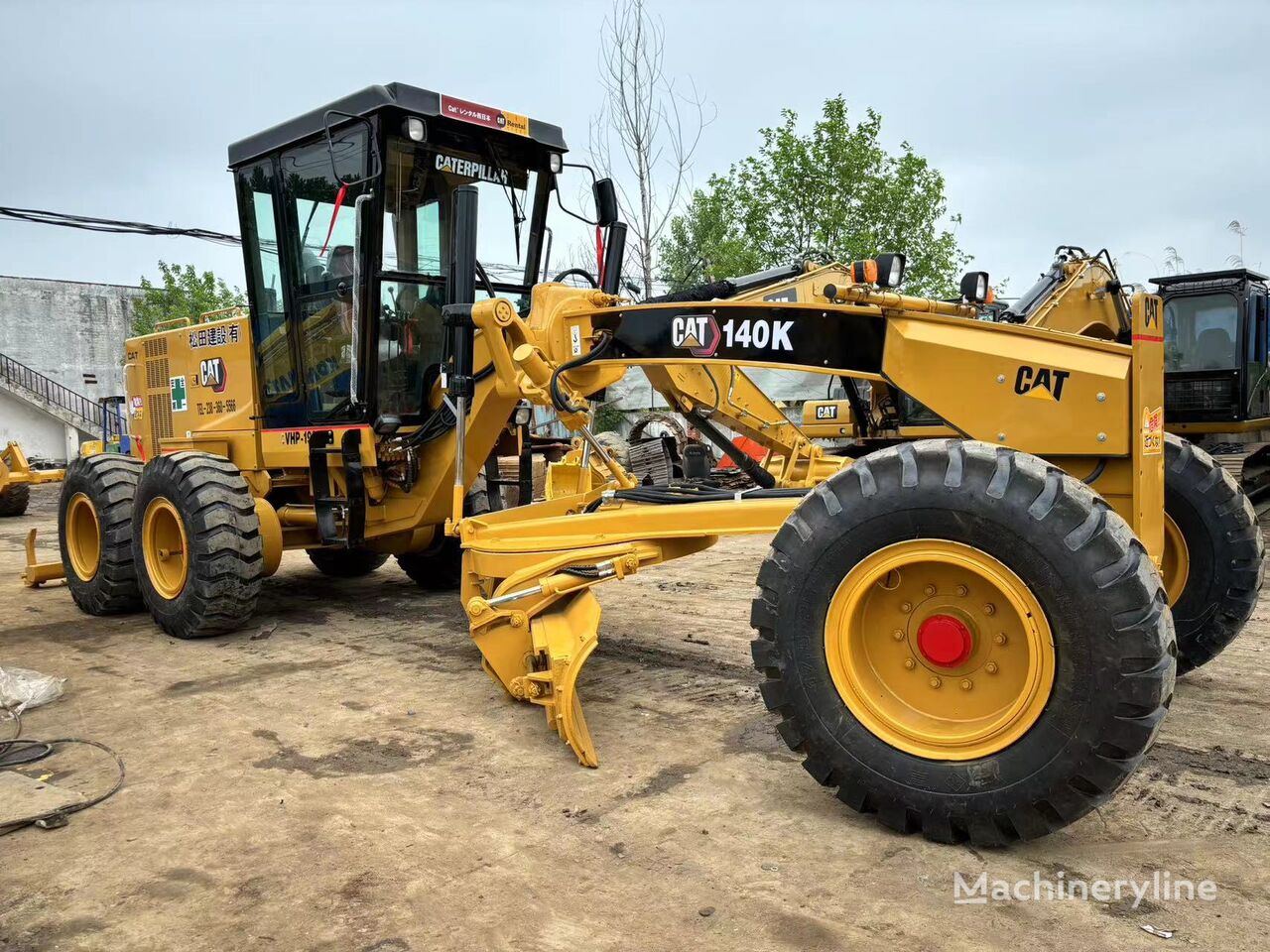 CAT 140K grader