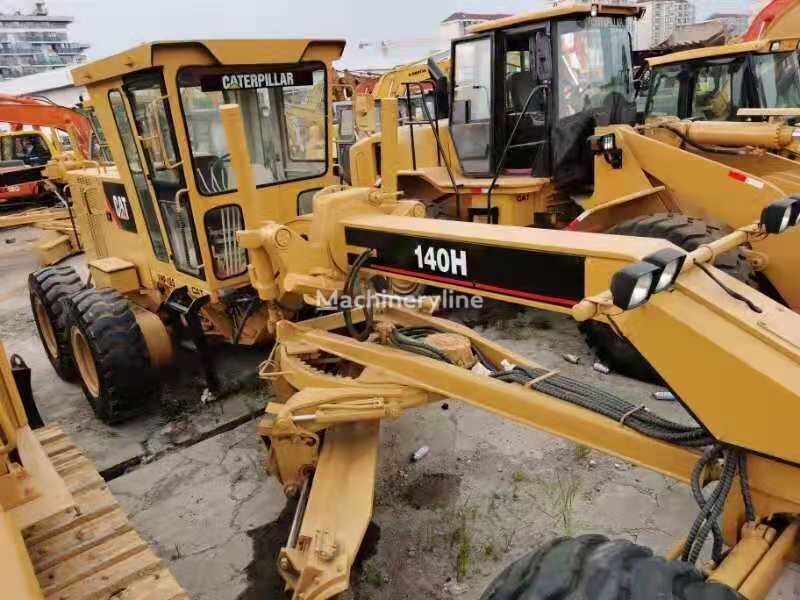 грейдер Caterpillar 140H