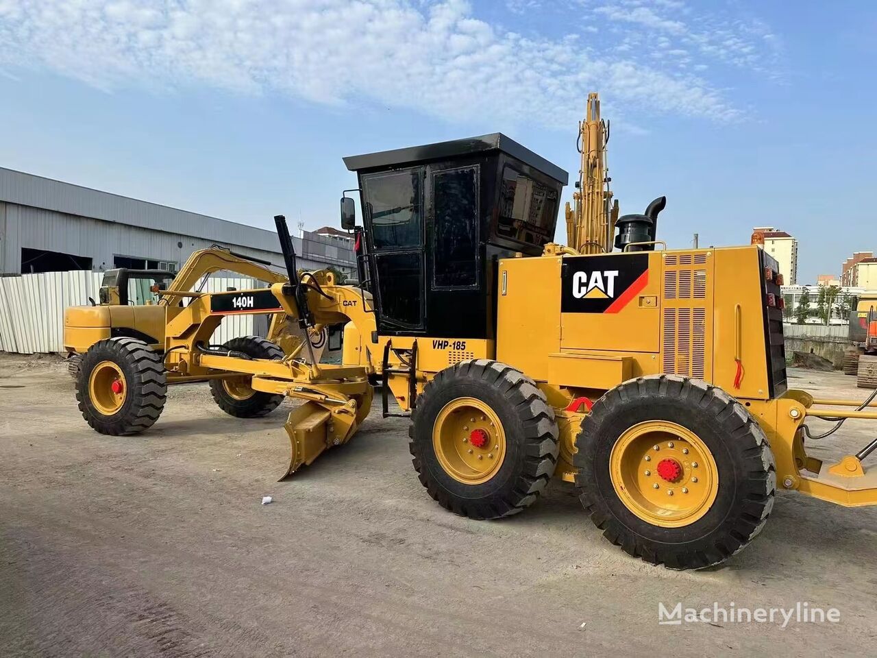 грейдер Caterpillar 140H