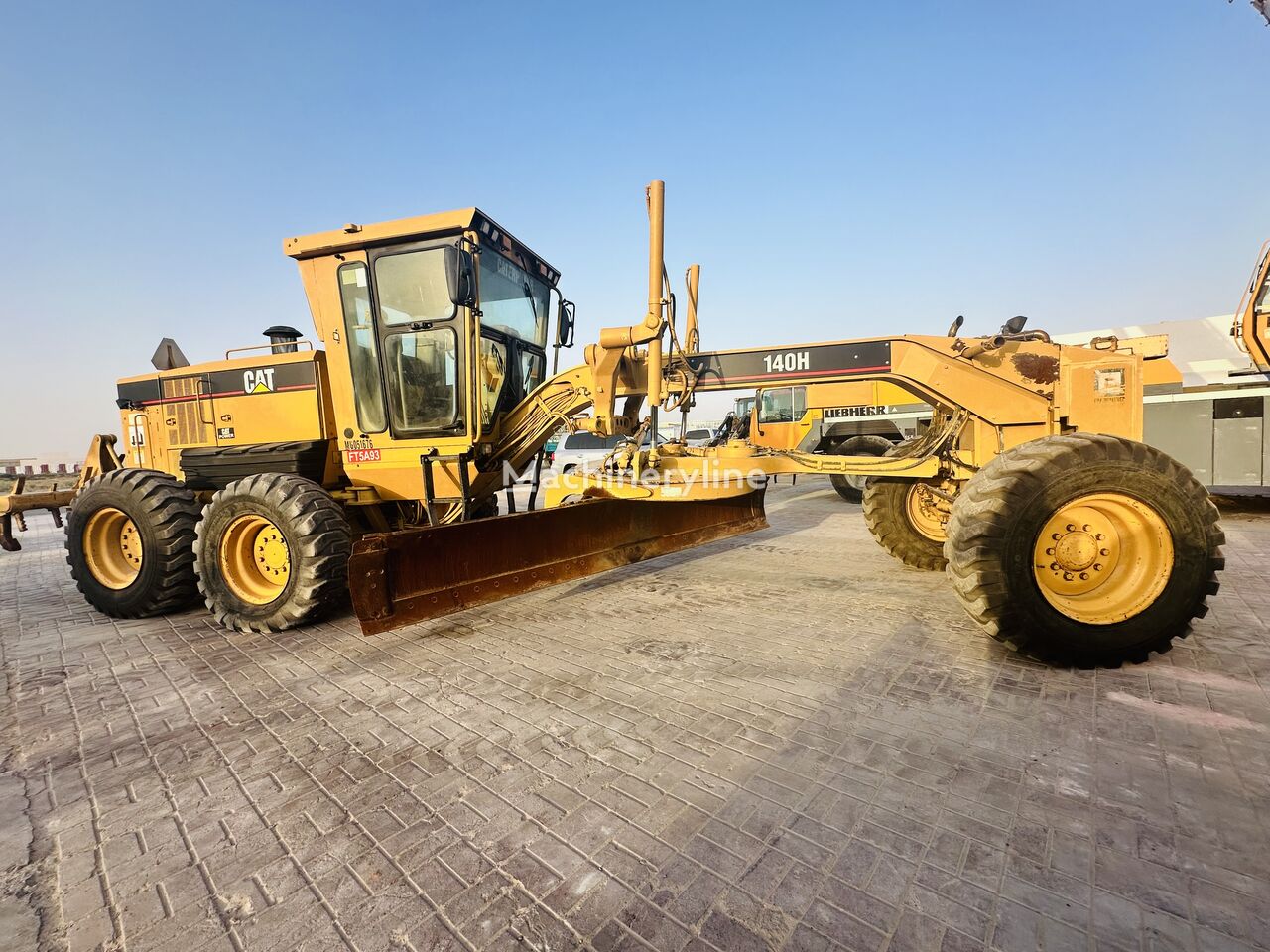 грейдер Caterpillar 140H