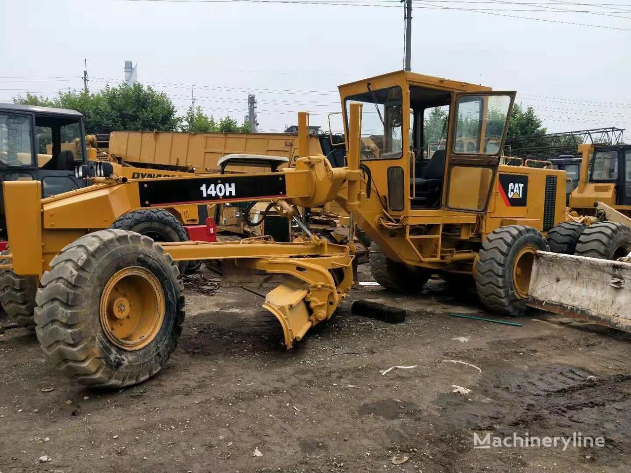 greideris Caterpillar 140H  140K