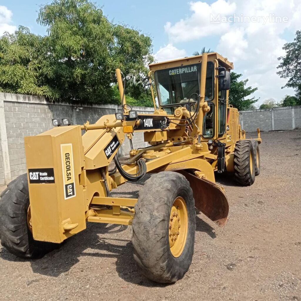 грейдер Caterpillar 140K