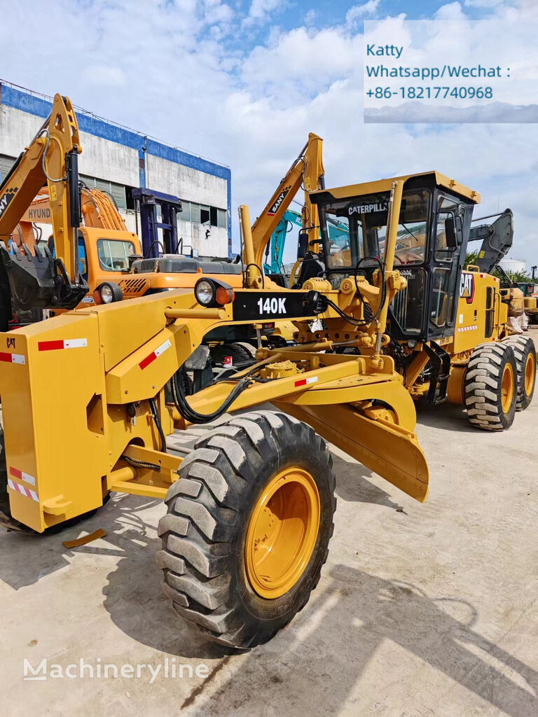 грейдер Caterpillar 140k