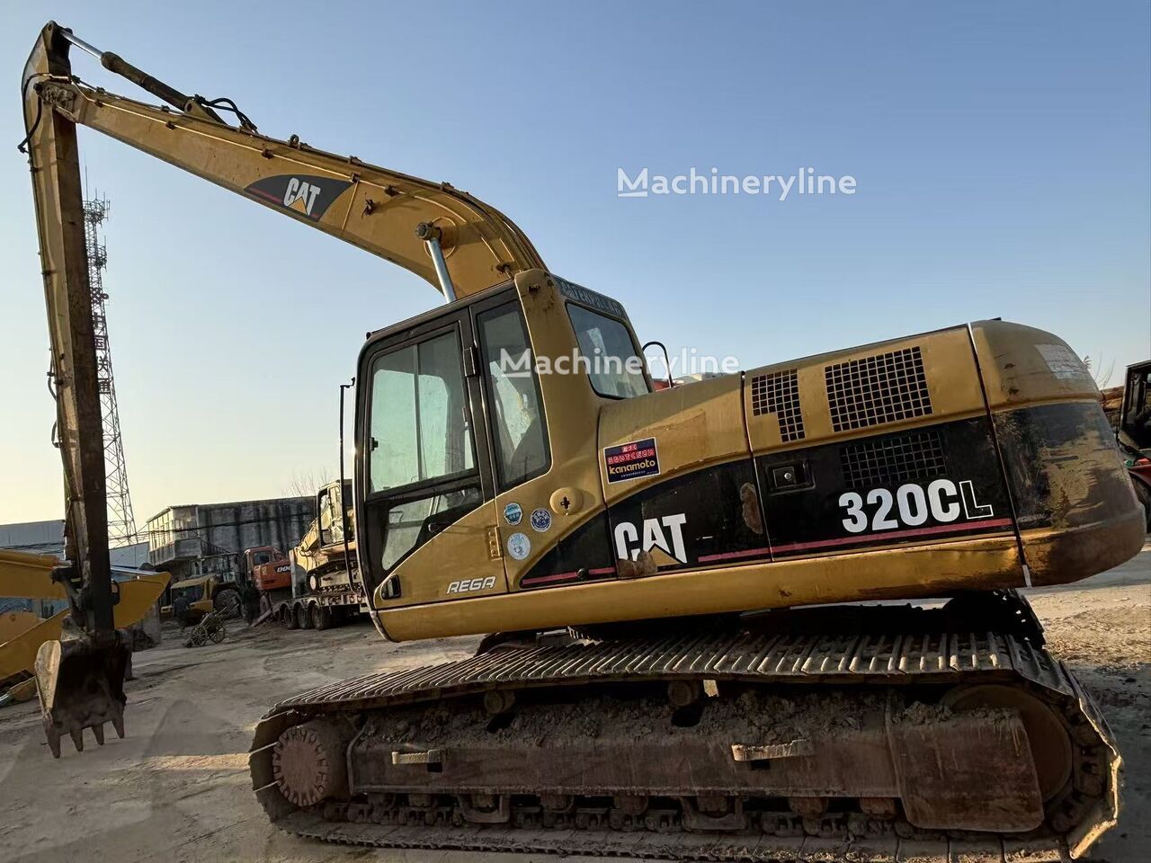 Caterpillar 320CL ekskavators ar garu strēli - Machineryline