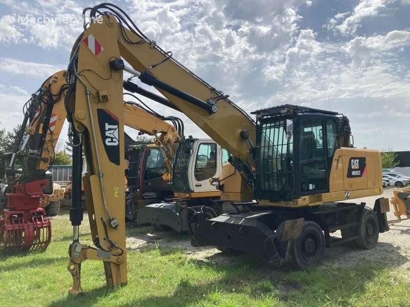 экскаватор для перевалки Caterpillar MH3022