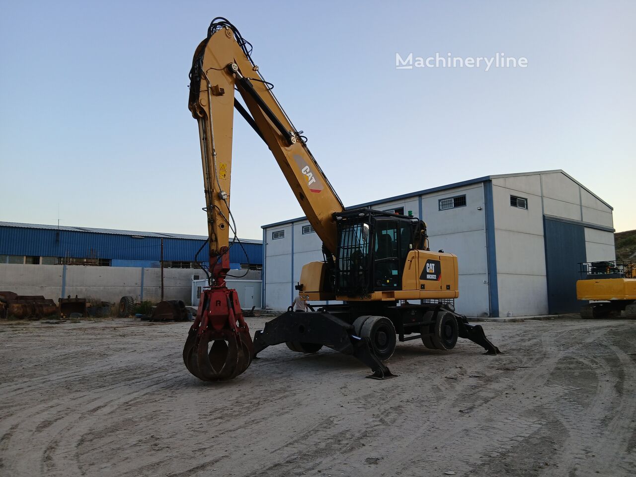 Купить экскаватор для перевалки Caterpillar MH3022 | Machineryline GE Экскаватор для перевалки Caterpillar MH3022 - Machineryline