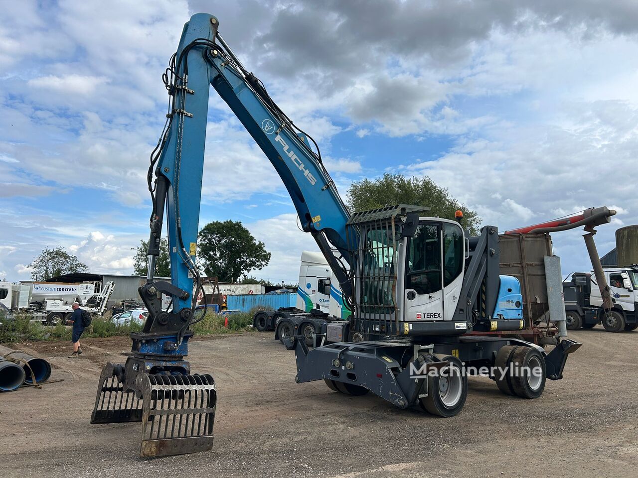 Fuchs MHL 250 material handler - Machineryline