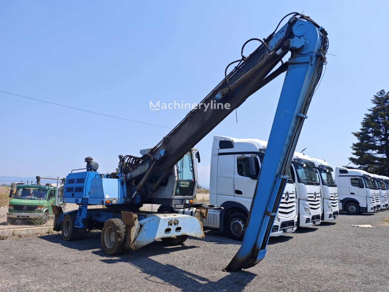 Купить экскаватор для перевалки Fuchs MHL 335 | Machineryline AM Экскаватор для перевалки Fuchs MHL 335 - Machineryline