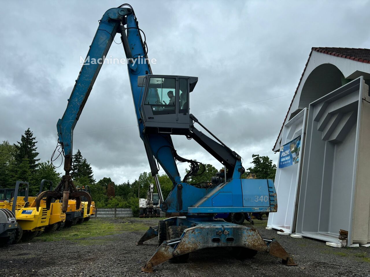 Купить экскаватор для перевалки Fuchs MHL 340 | Machineryline KG Экскаватор для перевалки Fuchs MHL 340 - Machineryline