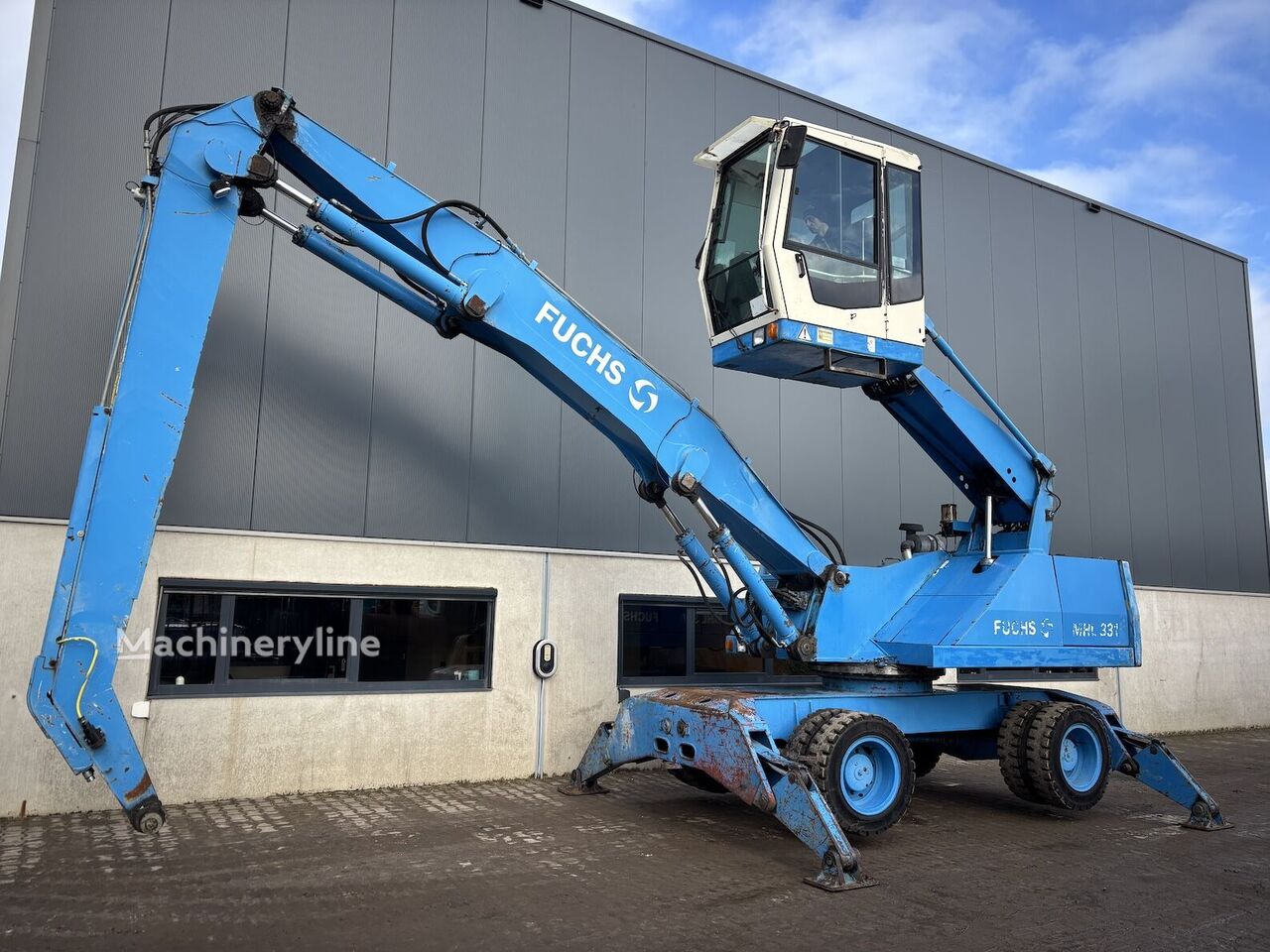Ekskavaator-ümberlaadur Fuchs MHL331C - Machineryline
