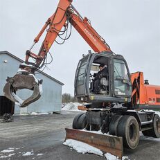 Hitachi ZX140W-3 manipulador de materiales