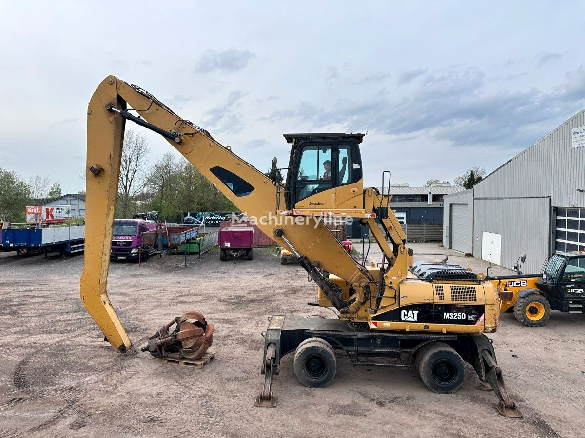 حفارة النقل والشحن Liebherr 934 M 325 D MH Reach 15.650 mm German machine