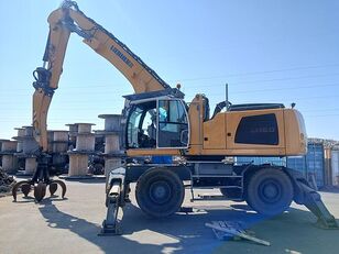 Liebherr LH 50 with grapple elleçleme makinesi