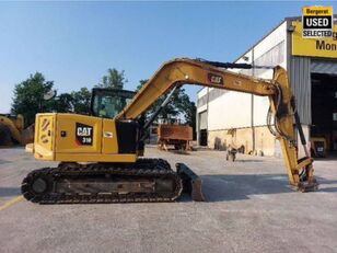 midi pelle Caterpillar 310