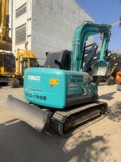 midi pelle Kobelco SK75