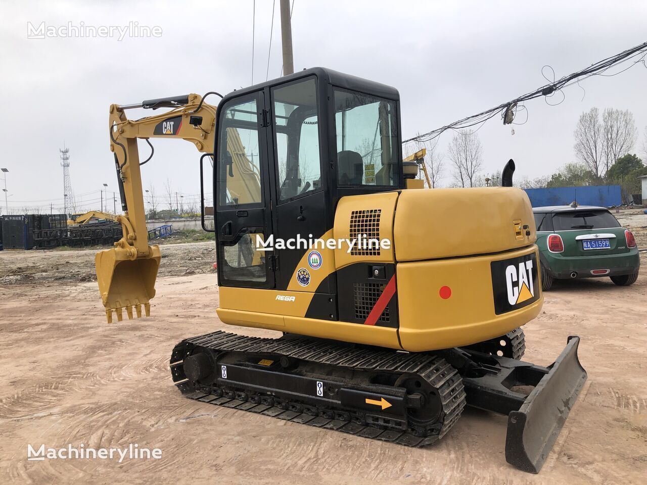 мини багер Caterpillar 306D