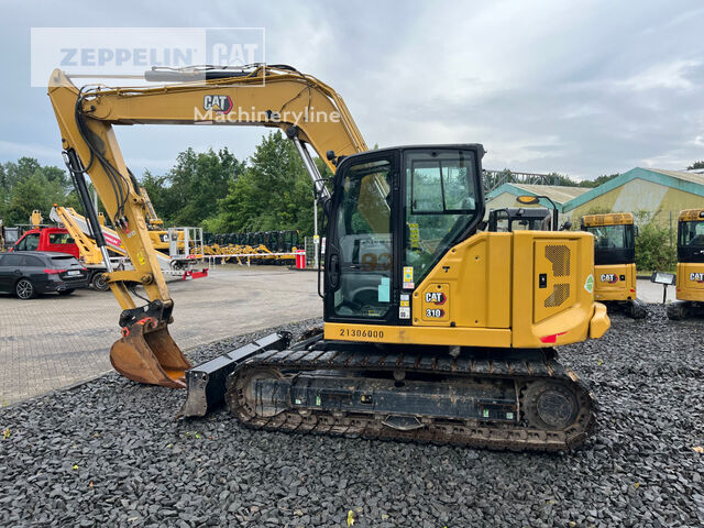 Caterpillar 310 mini excavator