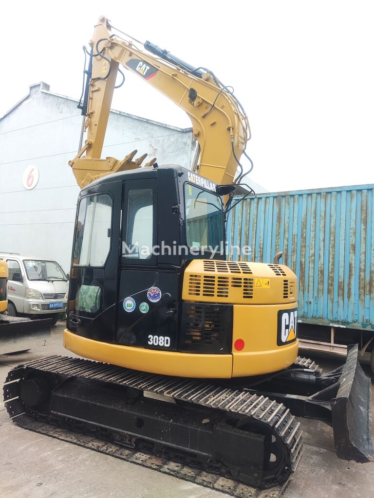 міні-екскаватор Caterpillar cat308