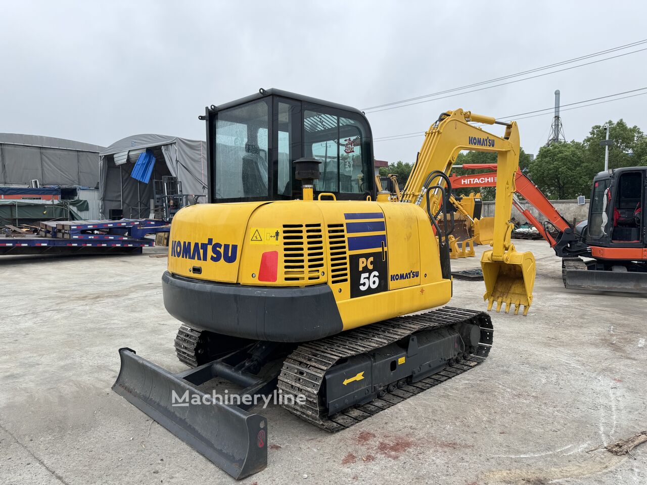 Мини багер Komatsu PC56 - Machineryline