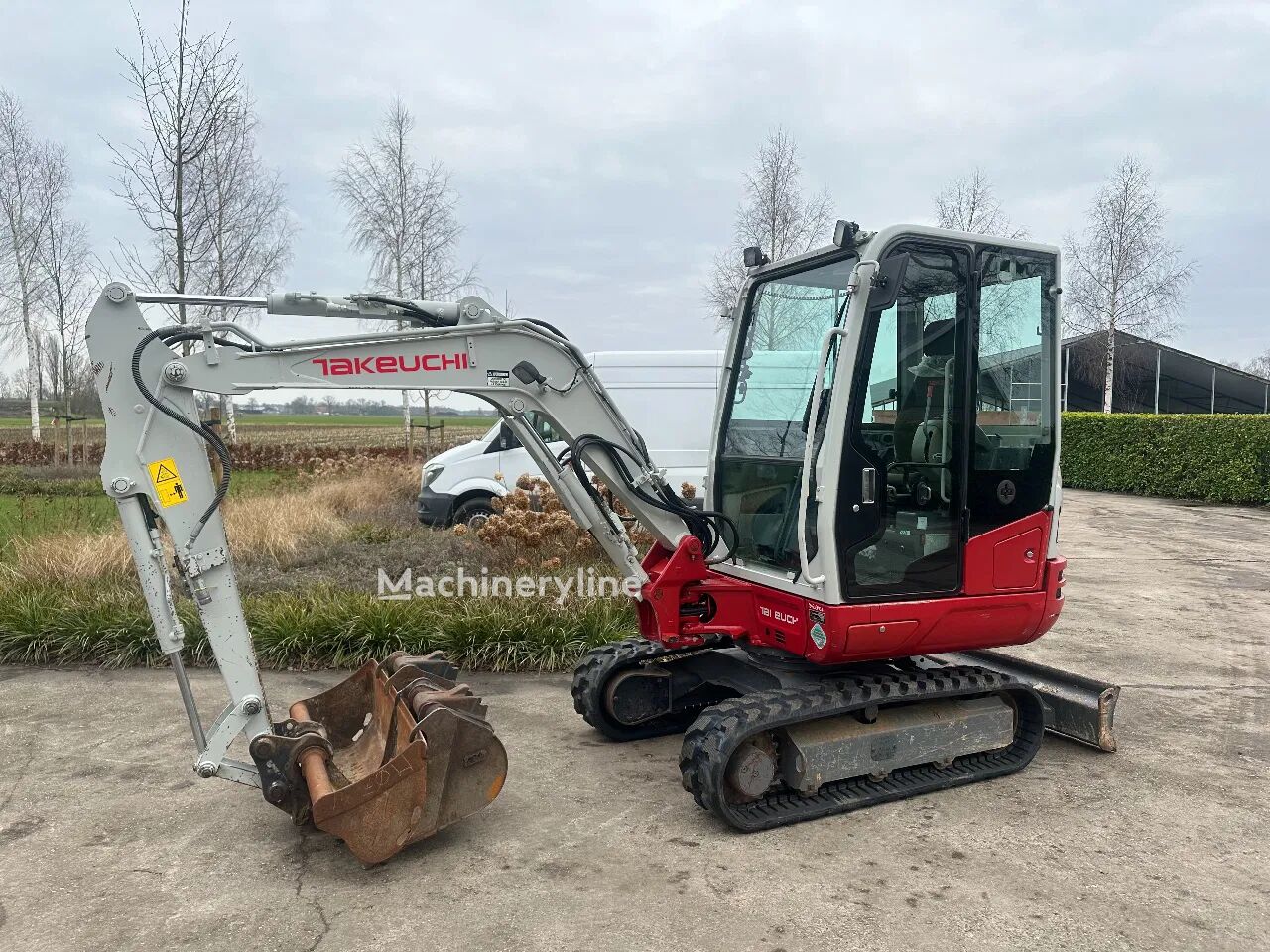 мини багер Takeuchi TB230