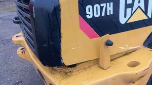 Caterpillar 907H multifunktionel l&aelig;sser