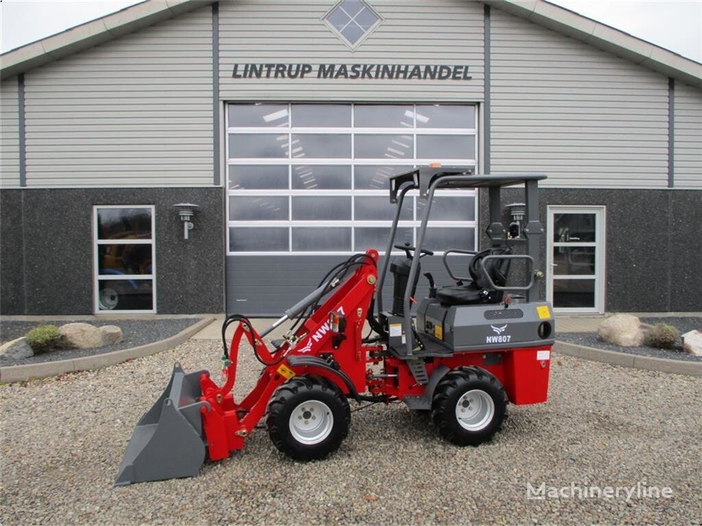 New Holland  807 multifunctional loader