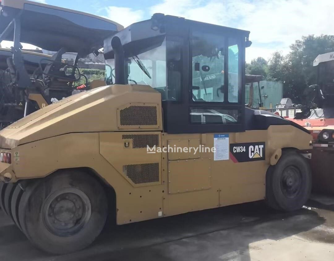 공압 롤러 Caterpillar CW34 - Machineryline