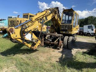 O&K AG MH S gravemaskin rail