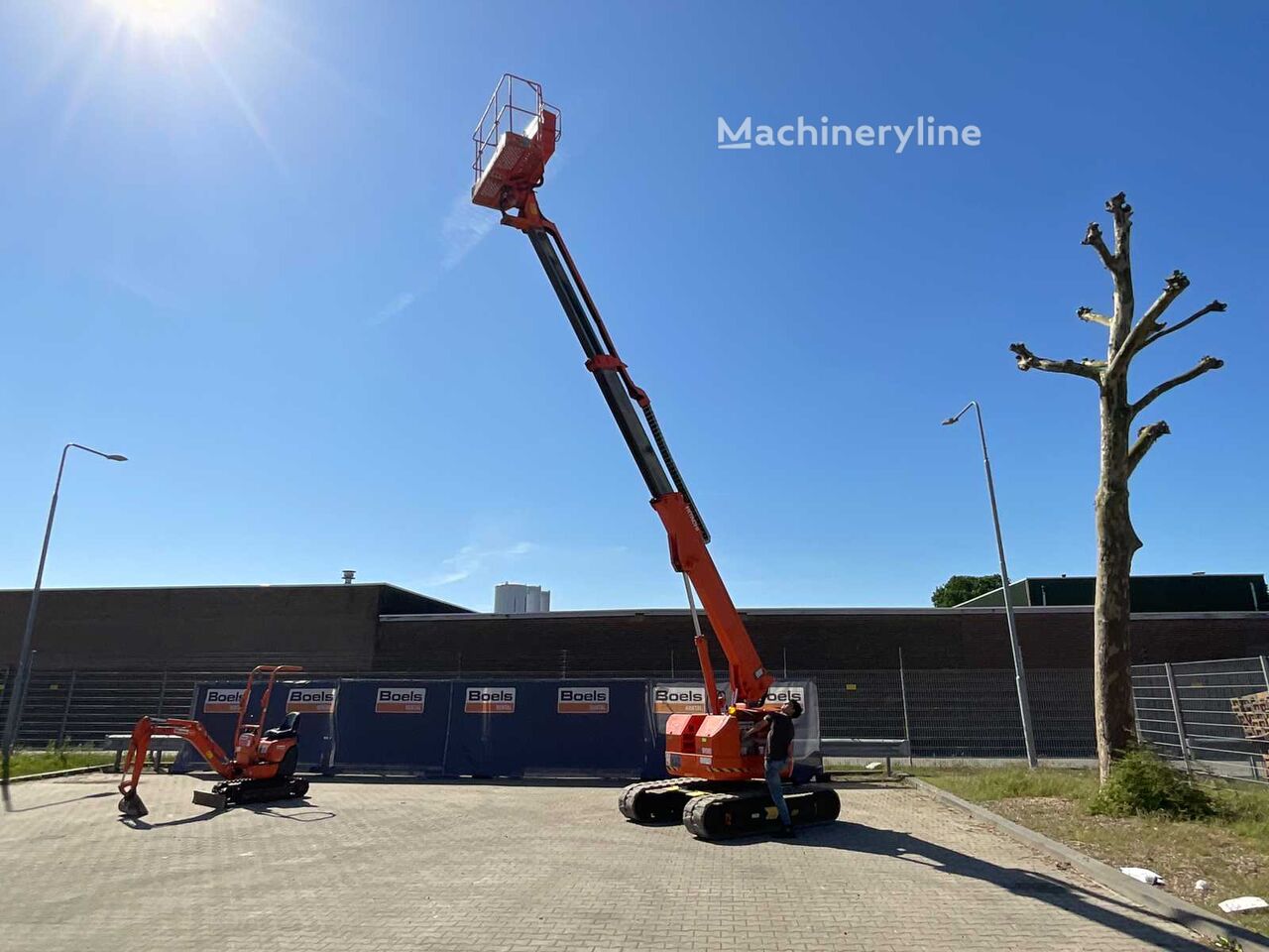 Купить ножничный подъемник Hitachi HX99B | Machineryline AM Ножничный подъемник Hitachi HX99B - Machineryline