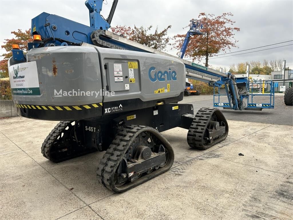 Pengangkat boom teleskopik Genie S-65 Trax (6316) - Machineryline