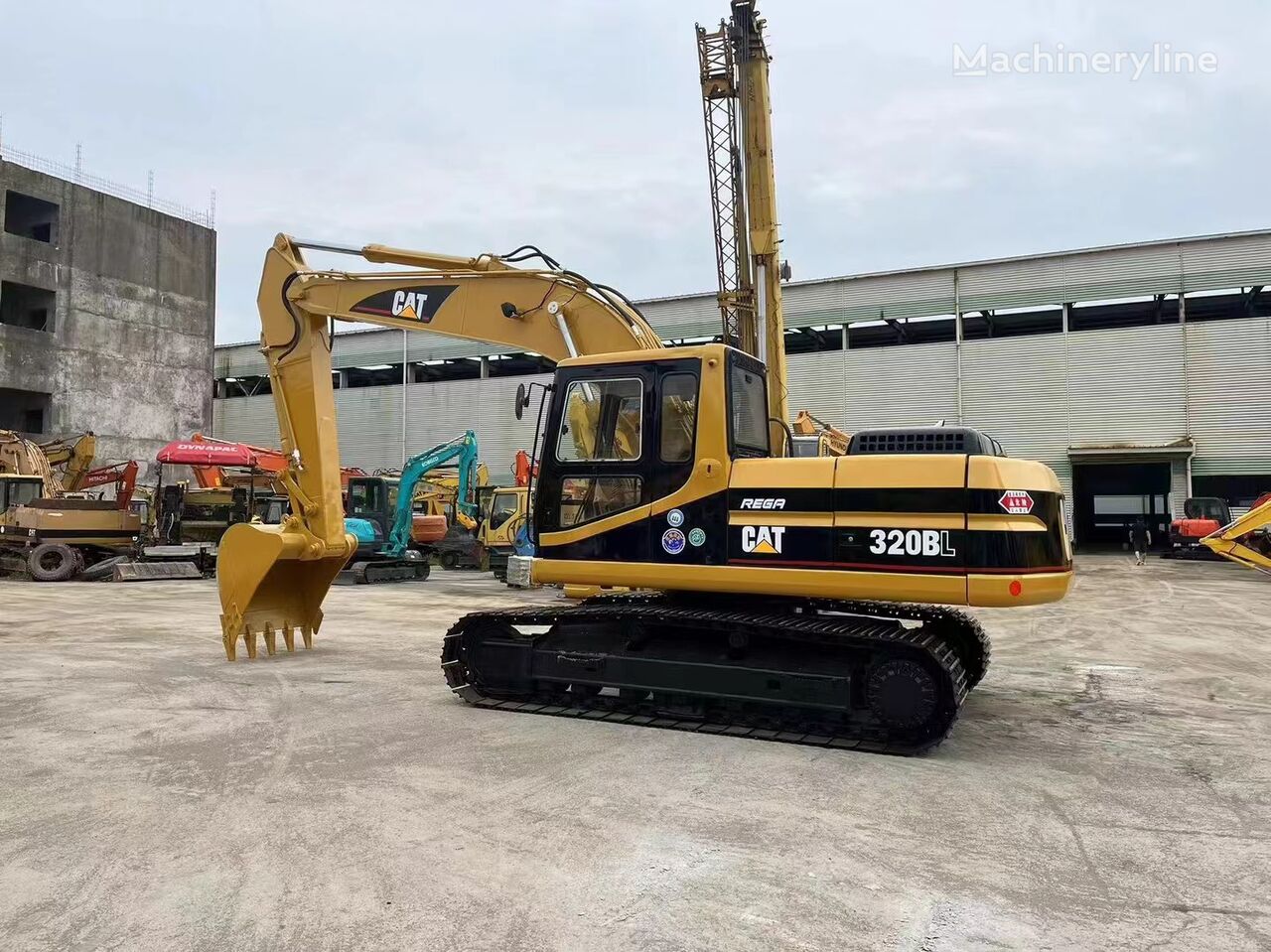 CAT 320BL beltegraver