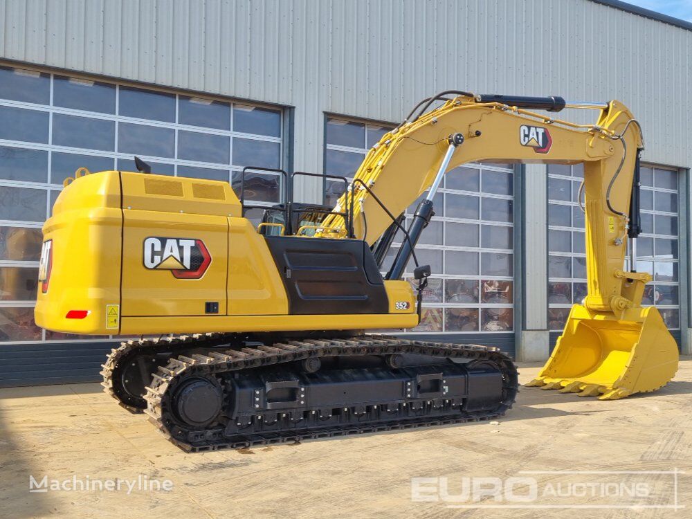 jauns CAT 352 kāpurķēžu ekskavators