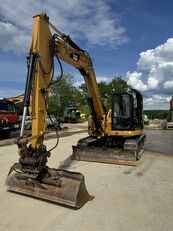 excavator dengan track Caterpillar