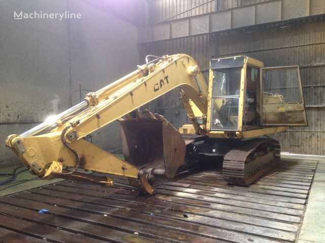 حفارة مجنزرة Caterpillar 215C LC من قطع الغيار