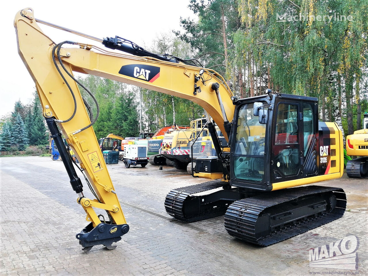 excavator dengan track Caterpillar 312E